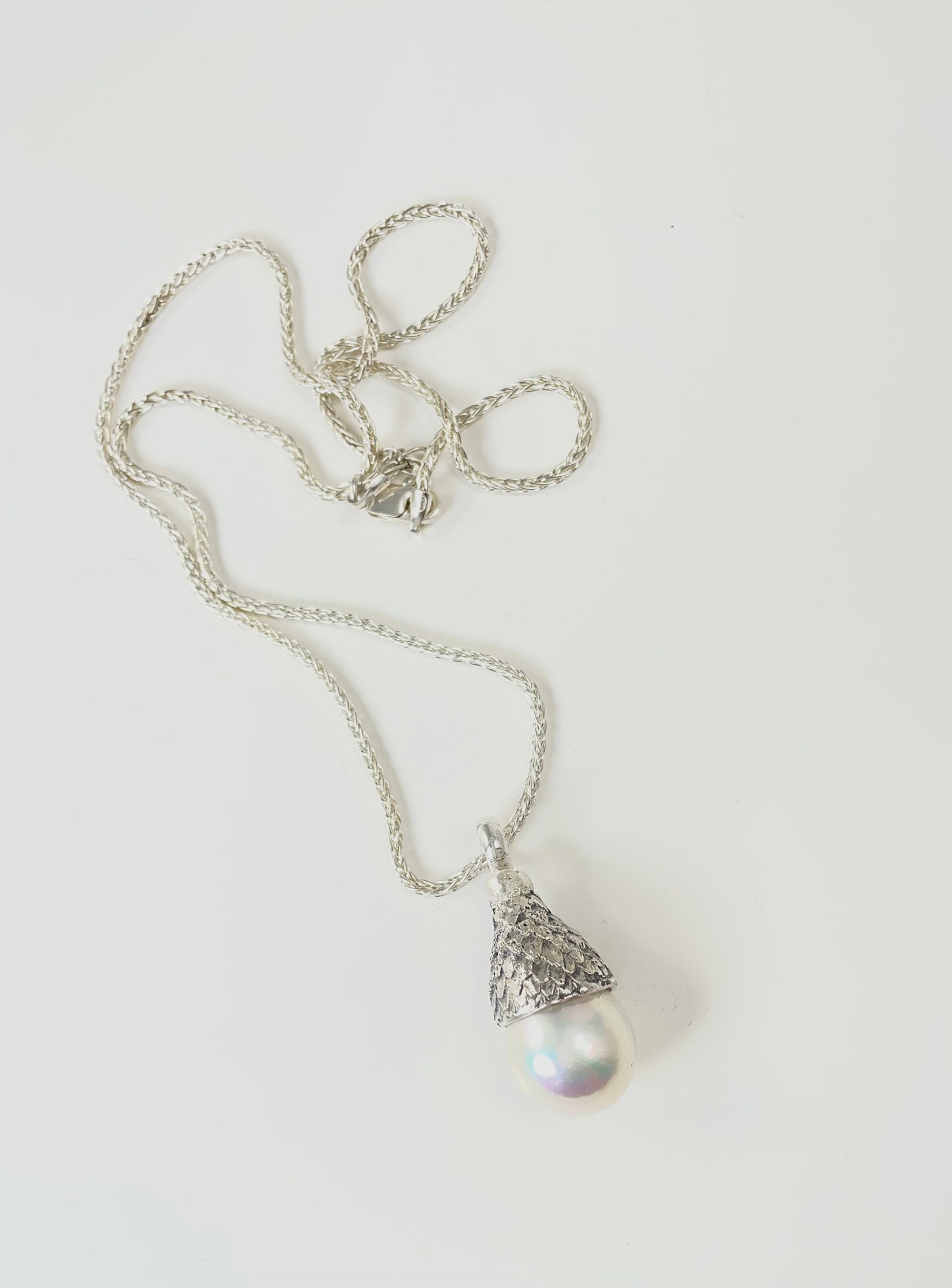 Baroque pearl set in sterling silver 'acorn' cap
