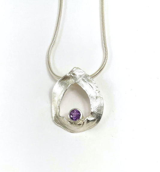 Sterling silver 'Mitsuro Hikime' pendant with faceted amethyst.