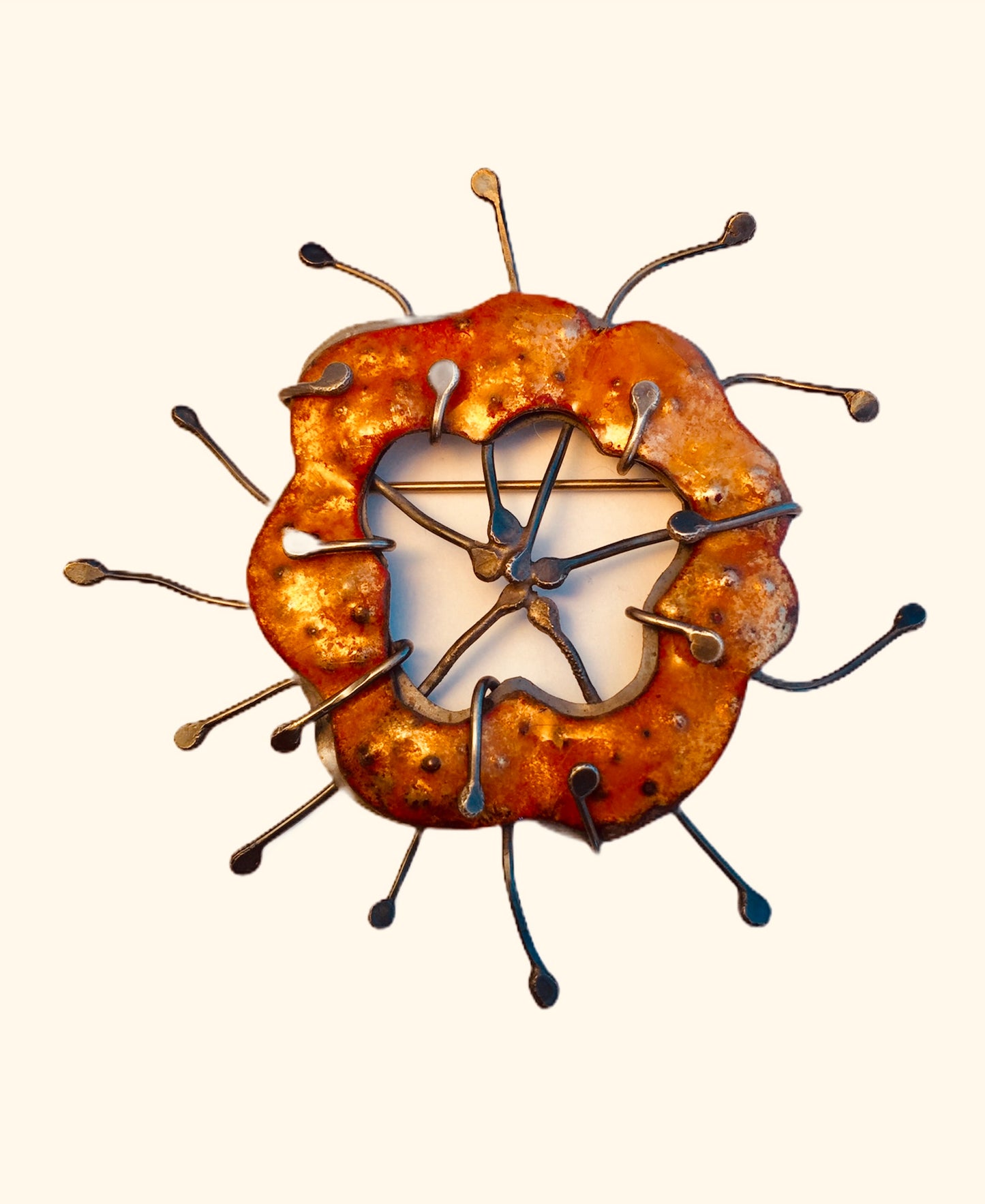 Sterling silver and orange enamel brooch