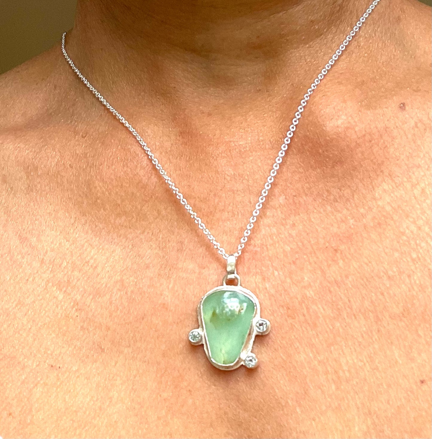 Peruvian opal and faceted topaz pendant