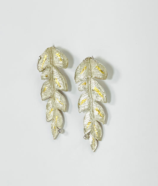Sterling silver leaf earrings with 24K gold accents and white sapphires