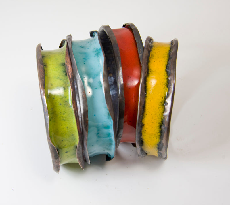 Anticlastic enameled bangles