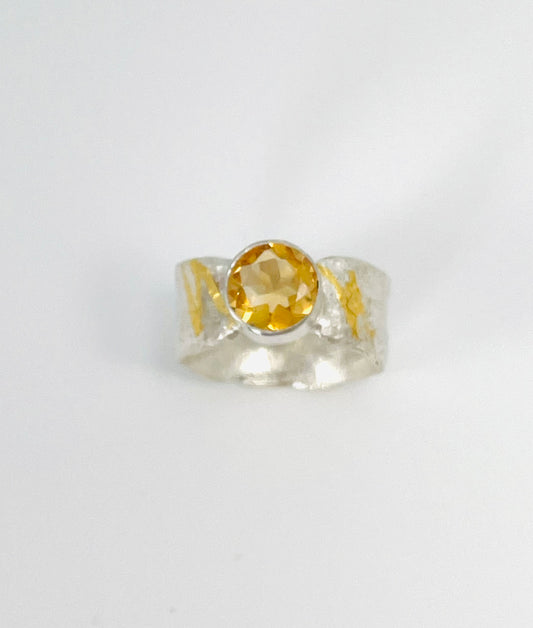 Citrine ring in silver with gold accents
