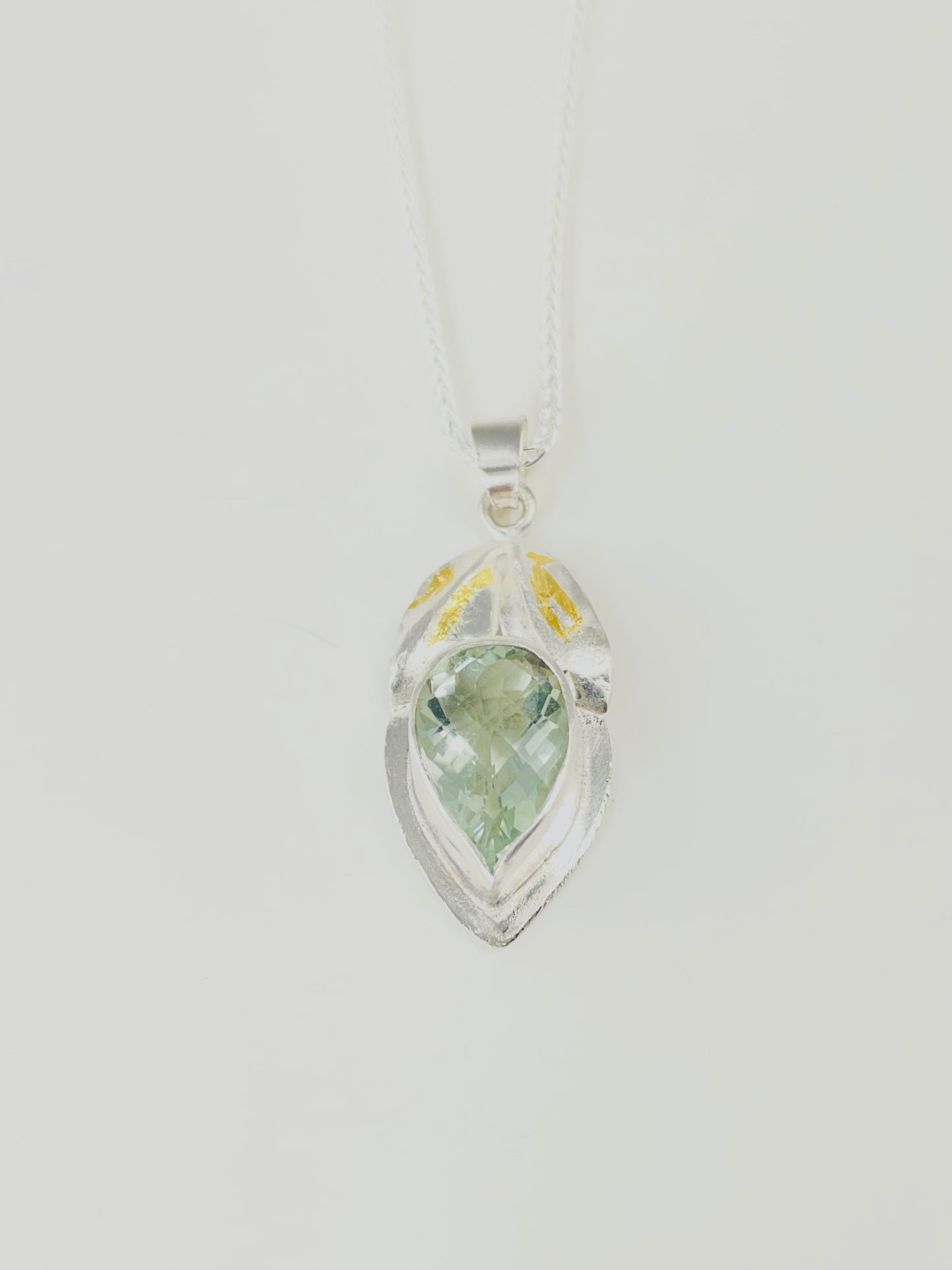 Parsiolite pendant on silver chain