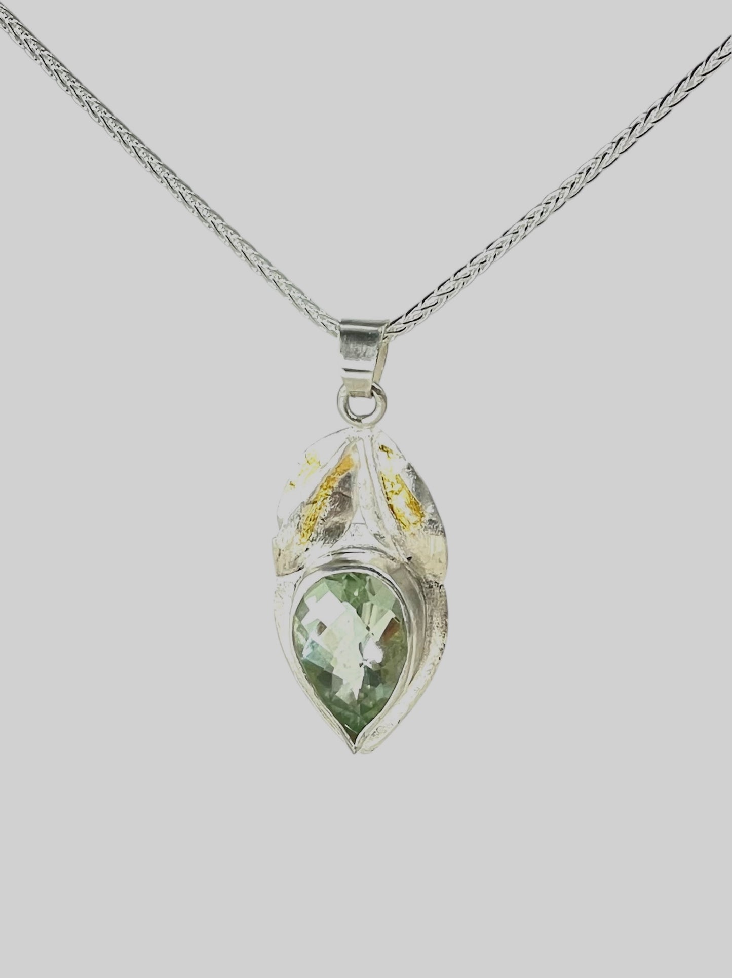 Parsiolite pendant on silver chain