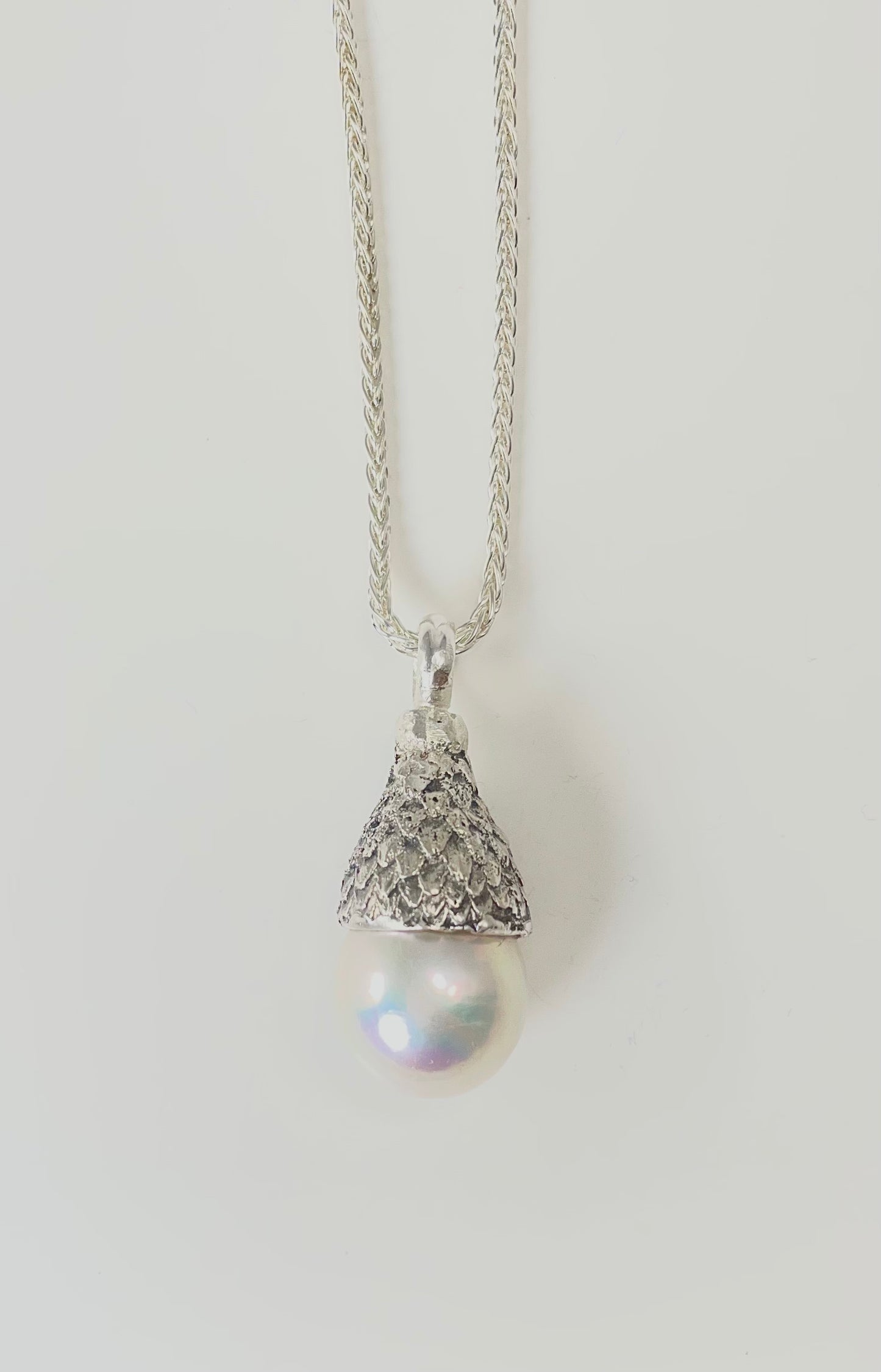 Baroque pearl set in sterling silver 'acorn' cap