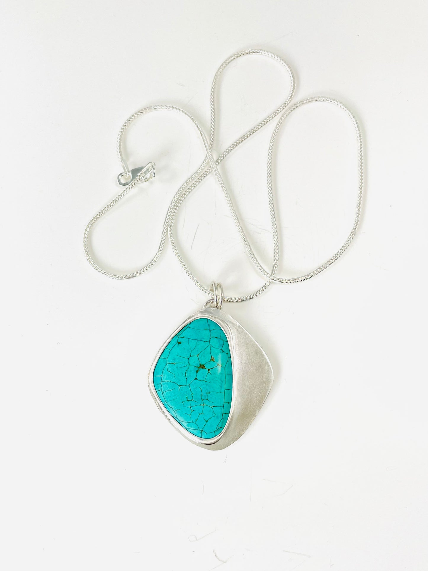 Sterling silver and turquoise pendant