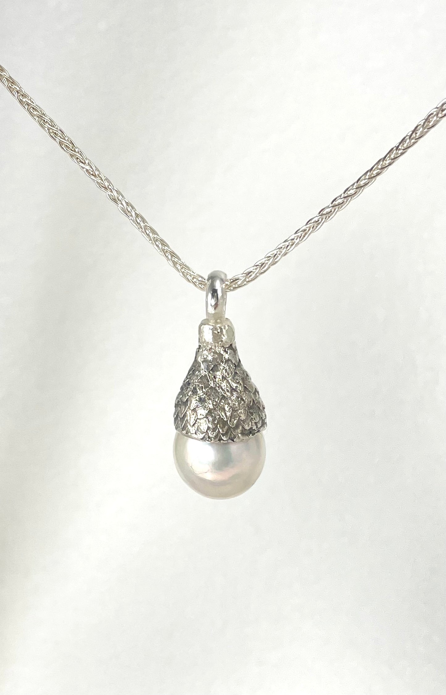 Baroque pearl set in sterling silver 'acorn' cap