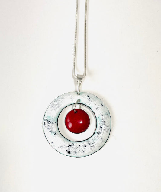 White and red enamel donut pendant